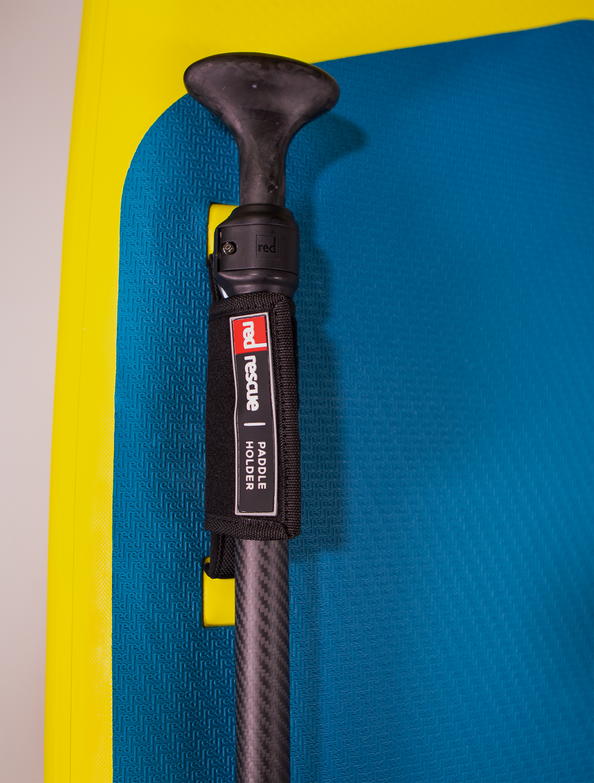 paddle holder for inflatable rescue sup