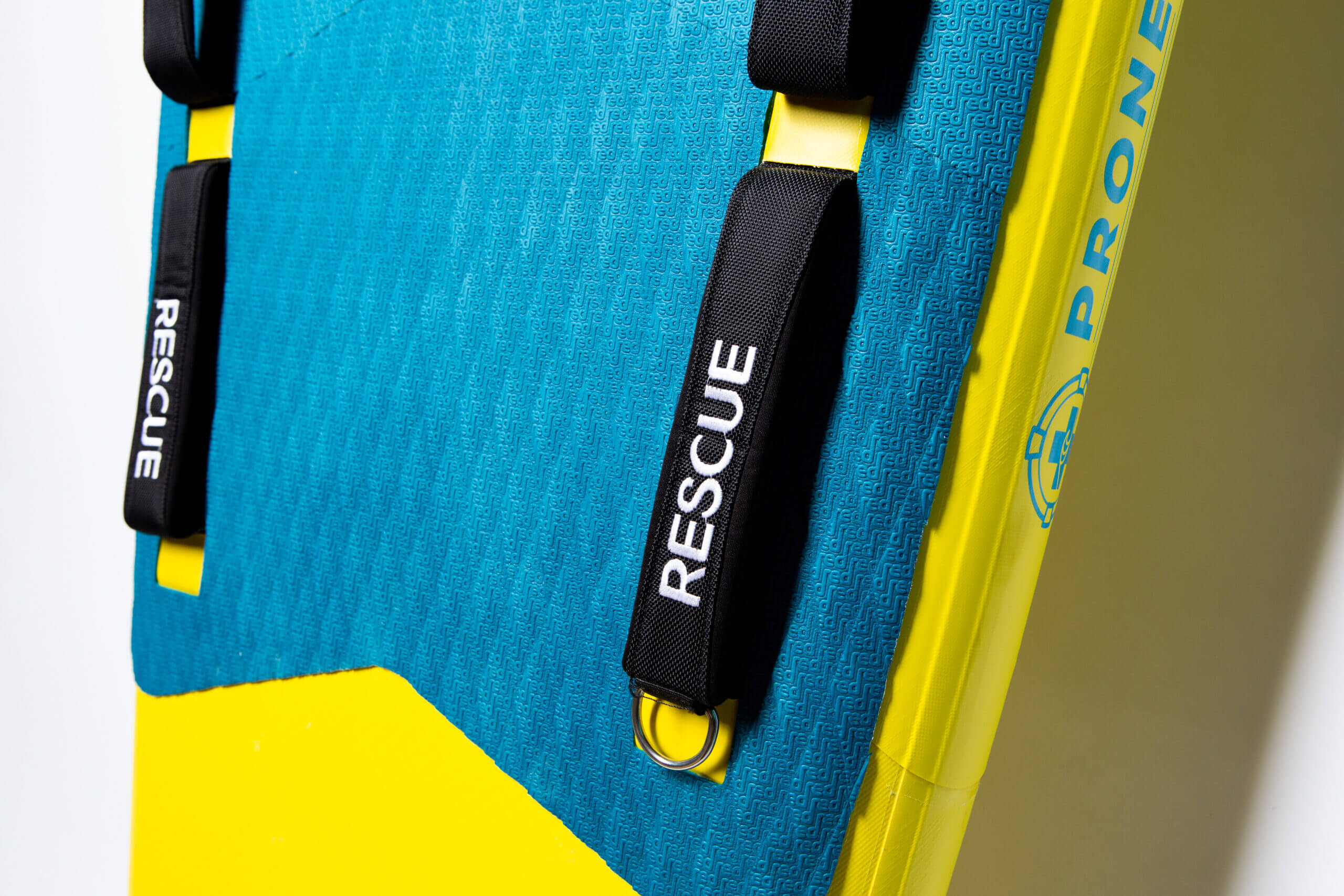 Inflatable rescue surfboard deckpad