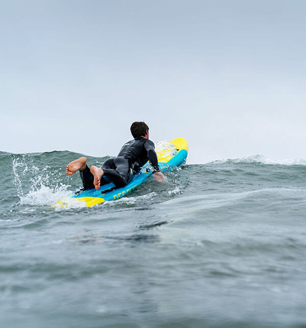 800×857-copy-600×643 copy paddling a surf lifesaving rescue board